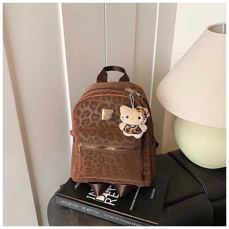 Leopard Print Backpack Lightweight Small Trendy Large Capacity Shoulder Bag Women's Travel Commute Bag showcase 19