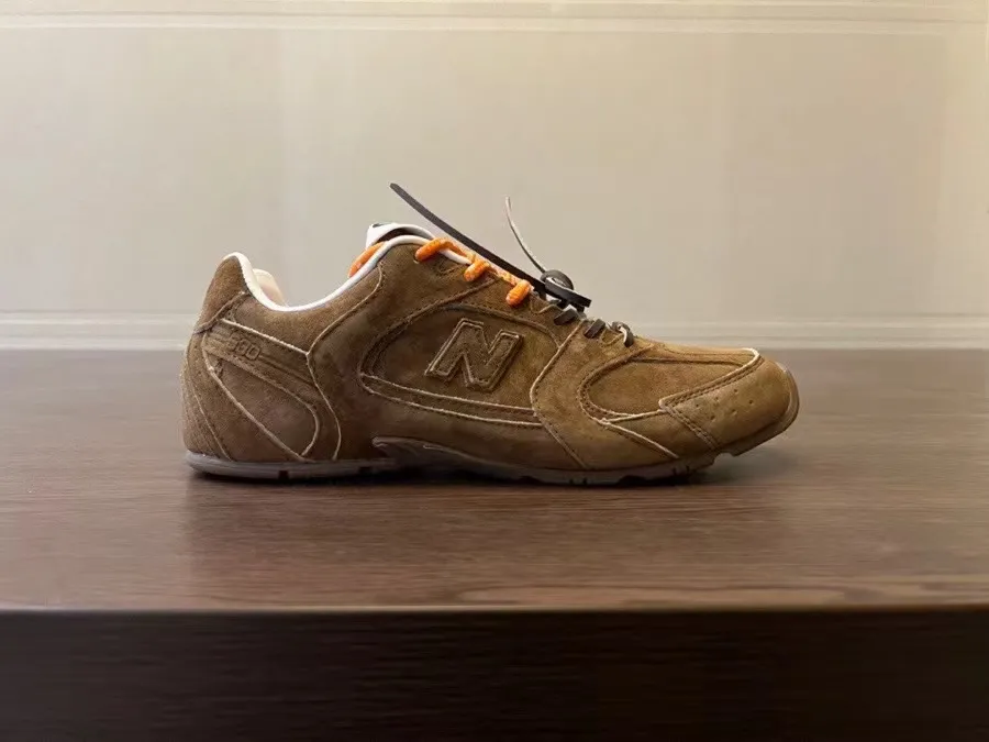 Miumiu Co-brand NB530 Casual Sneakers - Lightweight All-Match Running Shoes for Men and Women - Putian Shoes Company showcase 8
