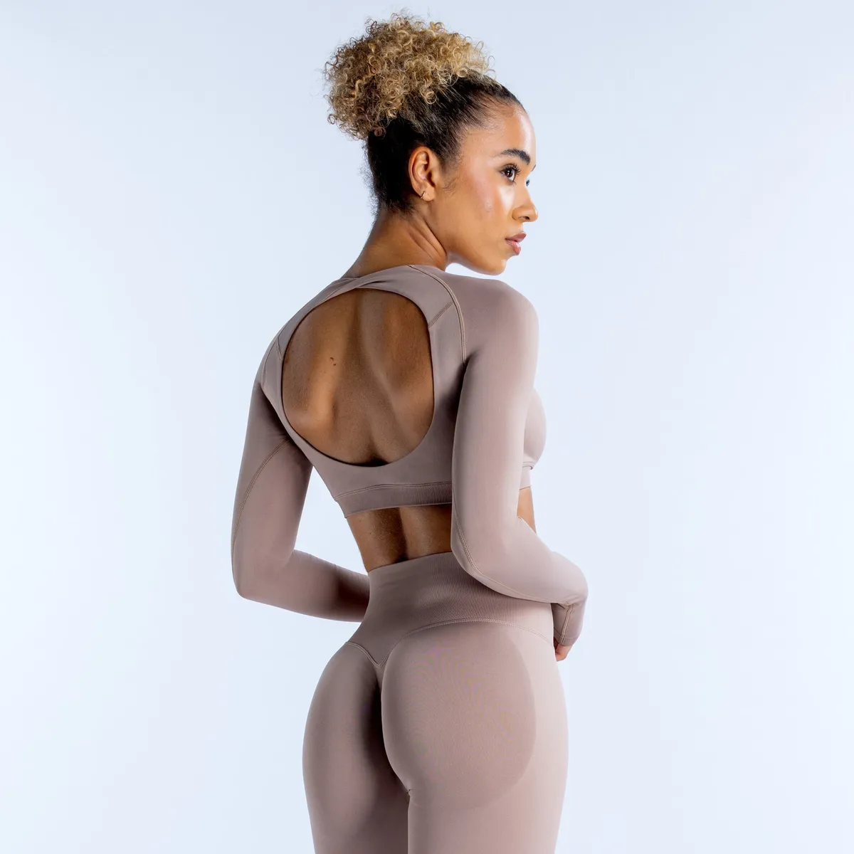 DFYNE Women's Crewneck Long Sleeve Crop Top with Hollow Back - Breathable Yoga & Athletic Wear for Active Lifestyles showcase 4