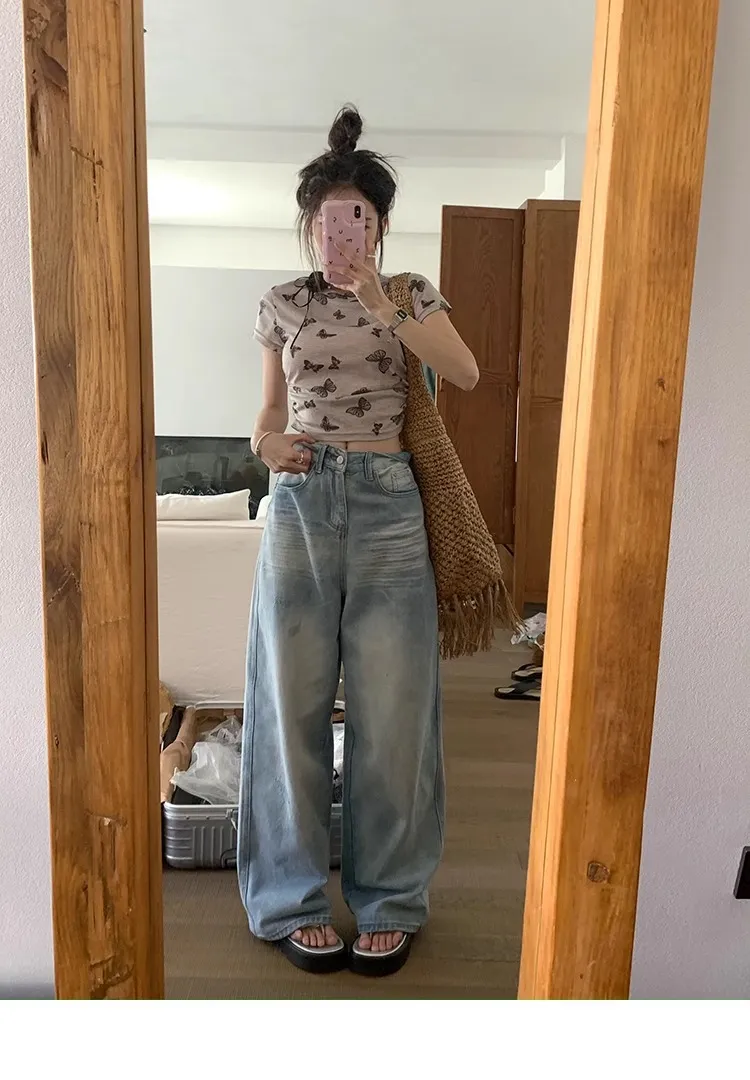 Plus Size Women's Light Blue Ripped Wide Leg Jeans - Summer Loose Fit High Waist Straight Leg Pants for Fashionable Comfort showcase 19