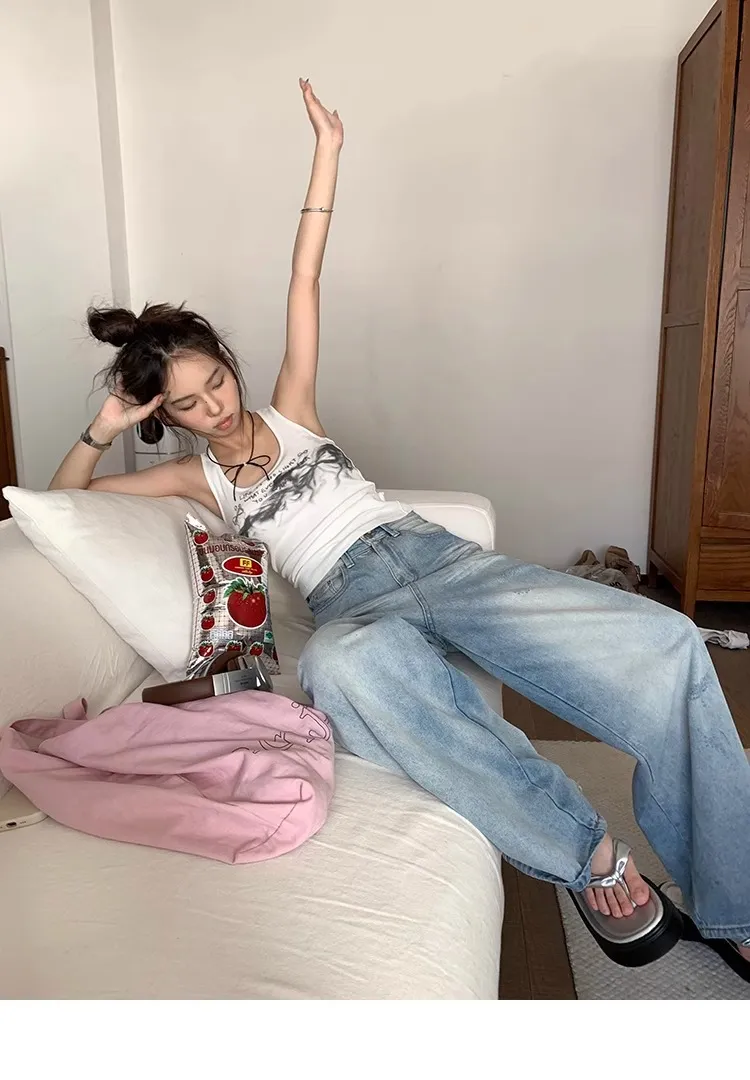 Plus Size Women's Light Blue Ripped Wide Leg Jeans - Summer Loose Fit High Waist Straight Leg Pants for Fashionable Comfort showcase 13