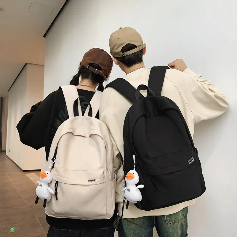 Large Capacity Waterproof Backpack for Men & Women - Japanese Style School Bag for Students, College, Travel, and Laptop - Image 1