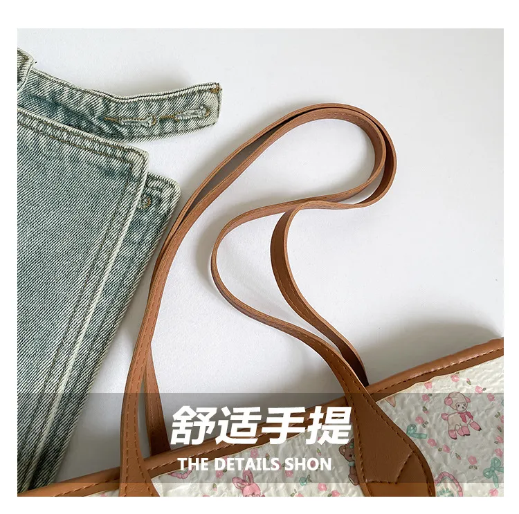 2025 New Women's High-End Armpit Bag Simple Shoulder Crossbody Versatile Temperament Handbag showcase 4