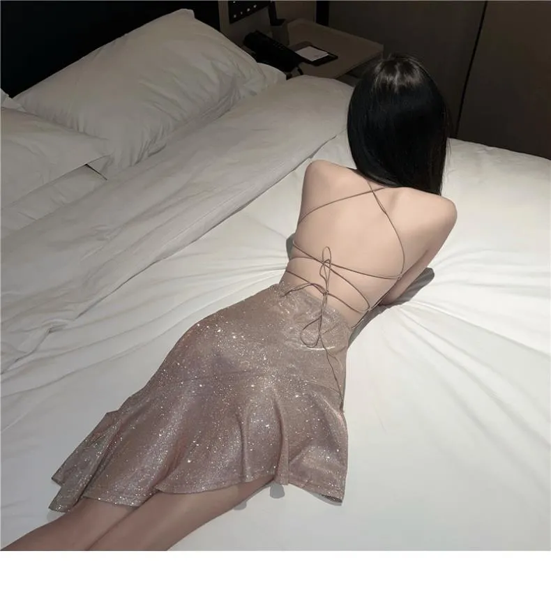 2025 Thai Sexy Shiny Silk Glitter Backless Slip Skirt Irregular Fishtail High Waist Slim Fit Hip Dress for Women showcase 6