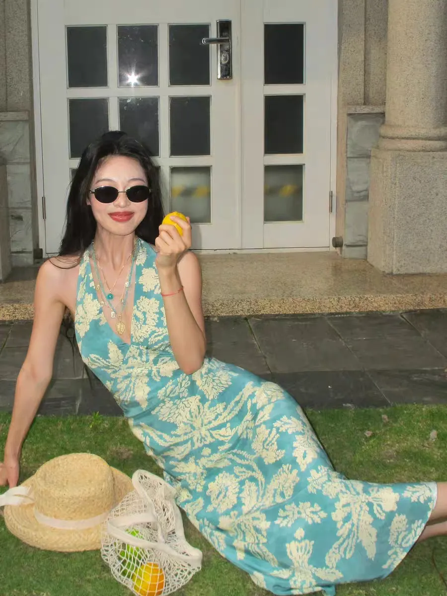 Elegant Blue Floral Print Halterneck Beach Maxi Dress - Sleeveless V-Neck Backless Waist-Cinching Design for Seaside Vacations showcase 11