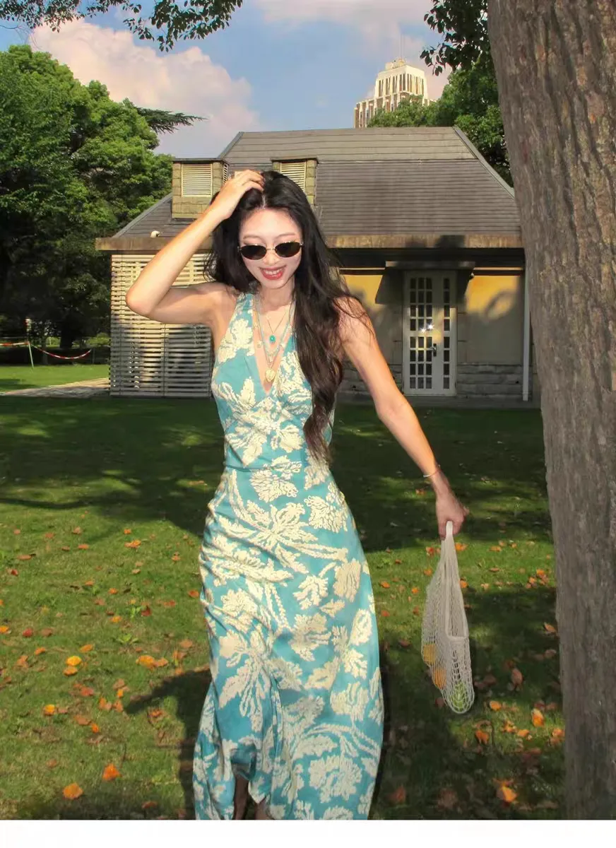 Elegant Blue Floral Print Halterneck Beach Maxi Dress - Sleeveless V-Neck Backless Waist-Cinching Design for Seaside Vacations showcase 4