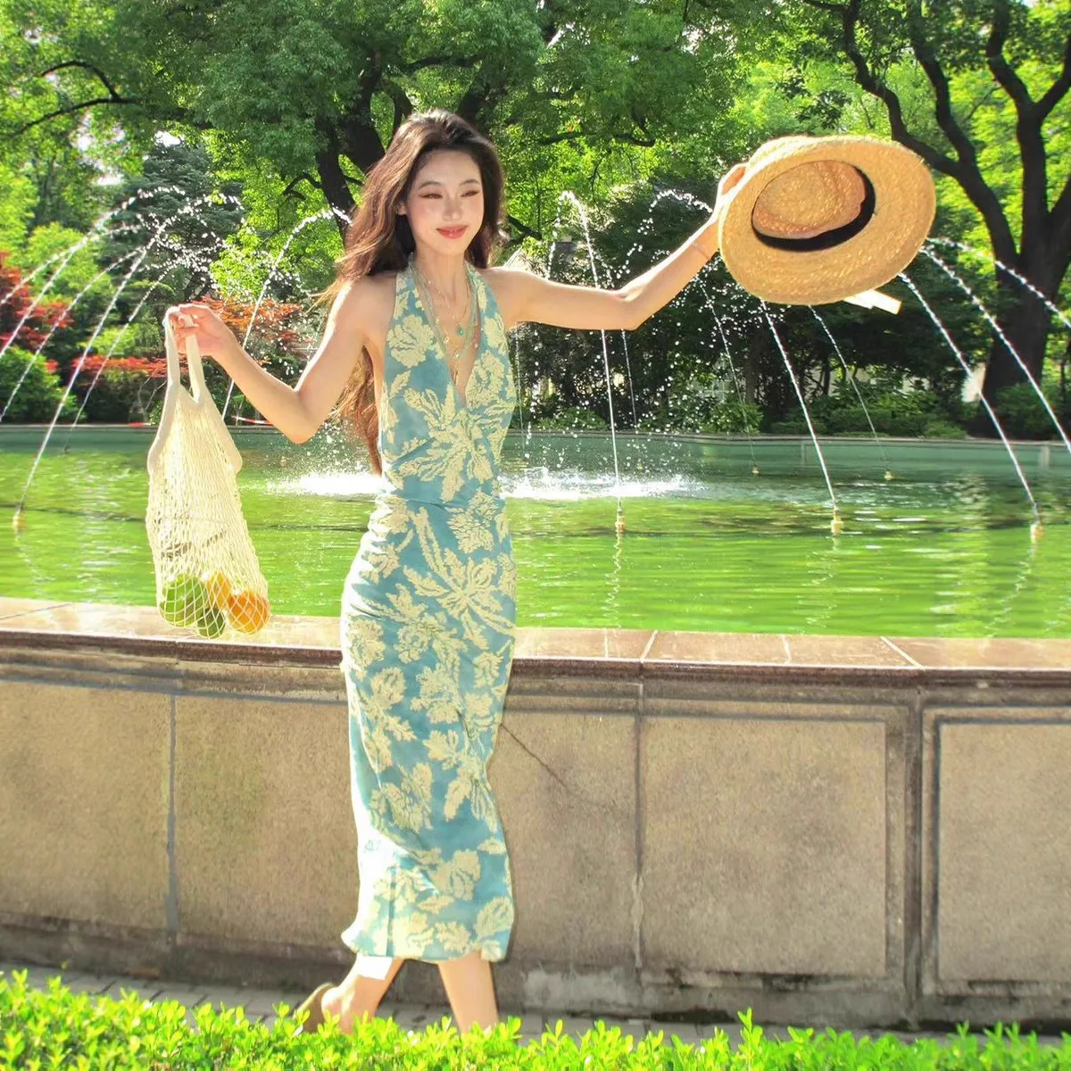 Elegant Blue Floral Print Halterneck Beach Maxi Dress - Sleeveless V-Neck Backless Waist-Cinching Design for Seaside Vacations - Image 4