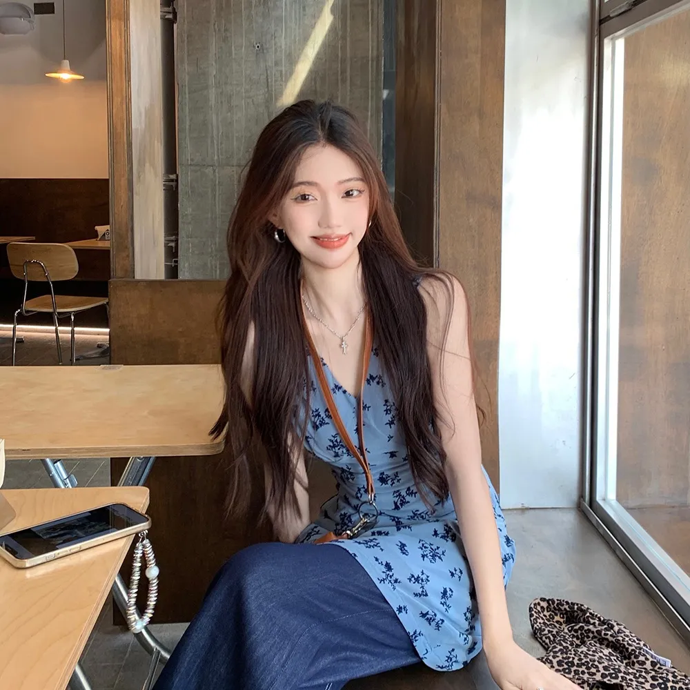Women's V-Neck Floral Vest Dress - Slim Fit Waist, Cut-Out Detail, Layered A-Line Short Skirt for Spring Fashion - Image 1