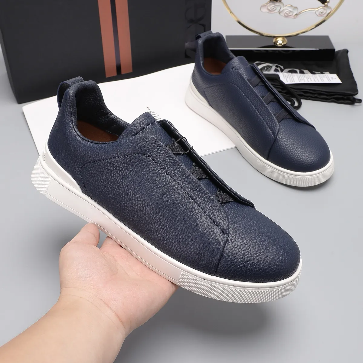 Men's Lightweight Cowhide Leather Sneakers, Breathable Slip-On Casual Sports Shoes, Versatile Low-Cut White Tennis Shoes for Daily Wear showcase 17