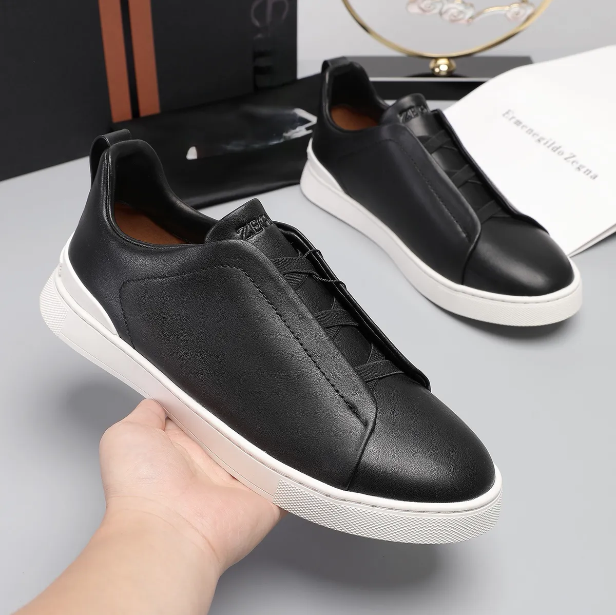 Men's Lightweight Cowhide Leather Sneakers, Breathable Slip-On Casual Sports Shoes, Versatile Low-Cut White Tennis Shoes for Daily Wear showcase 2