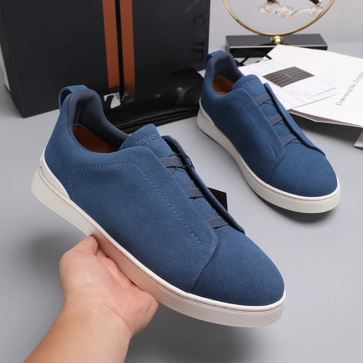 Men's Lightweight Cowhide Leather Sneakers, Breathable Slip-On Casual Sports Shoes, Versatile Low-Cut White Tennis Shoes for Daily Wear showcase 6