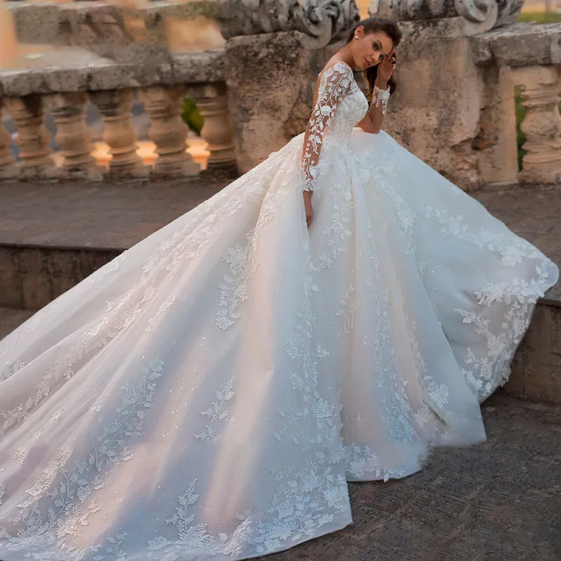 Elegant V-Neck Tulle Wedding Dress with Long Sleeves and Large Train - Retro Sexy Bridal Gown for Special Occasions thumbnail 1
