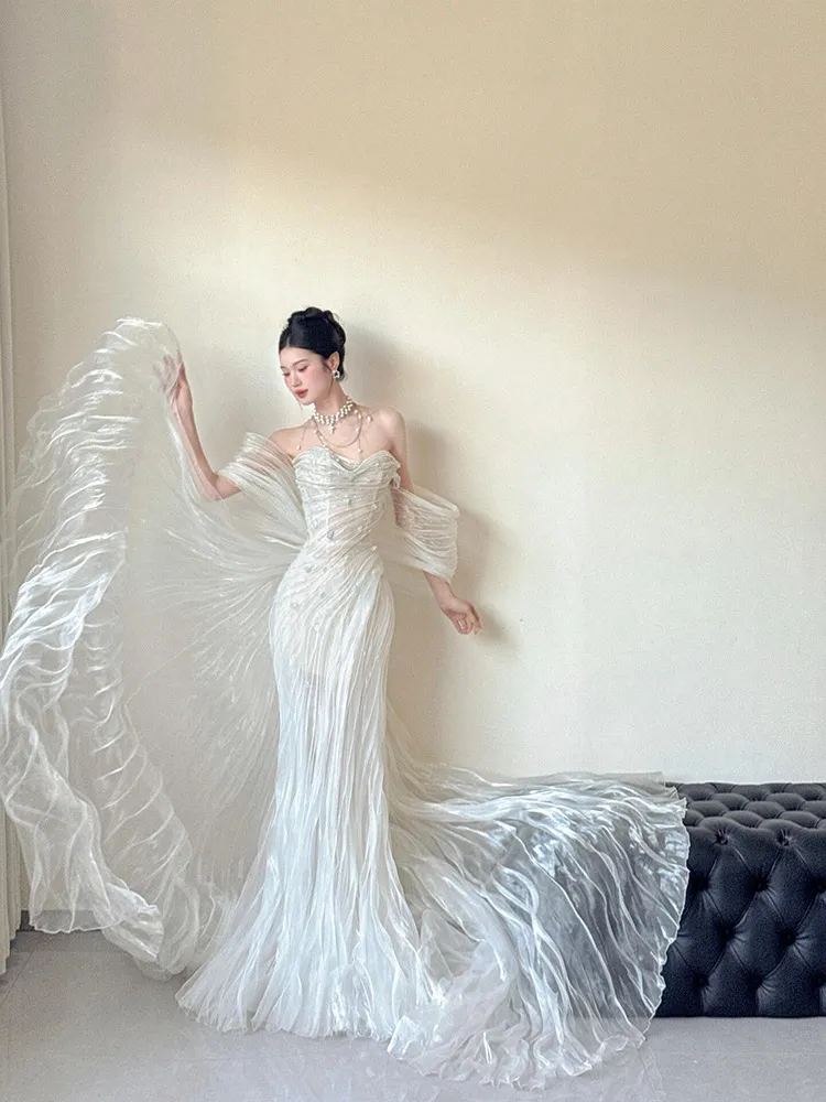 Elegant White Flowing Tulle Evening Gown with Heavy Craftsmanship, Light Luxury Niche Design, Off-Shoulder Mermaid Wedding Dress for Engagement and Bride's Toast showcase 5