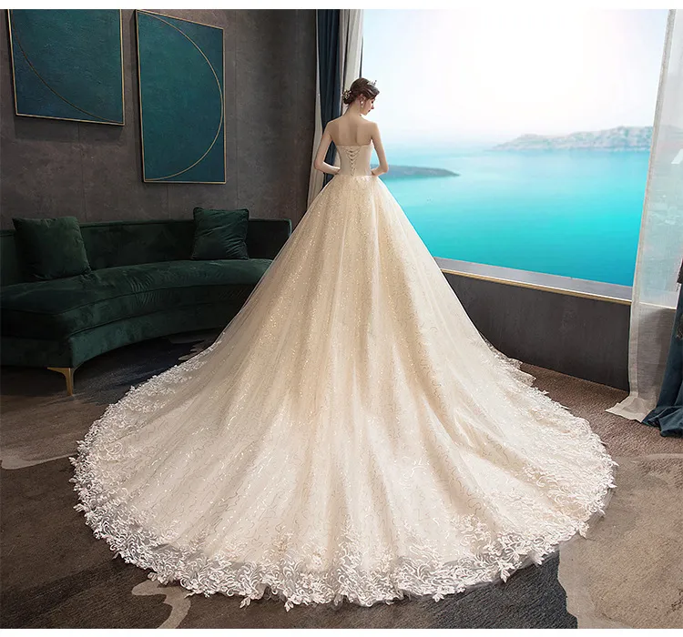 Elegant Strapless Slimming Wedding Dress 2026 Forest Style Bride Gown with Trailing Hem for a Simple and Chic Bridal Look showcase 15