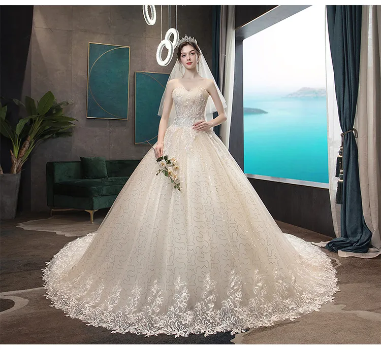 Elegant Strapless Slimming Wedding Dress 2026 Forest Style Bride Gown with Trailing Hem for a Simple and Chic Bridal Look showcase 12