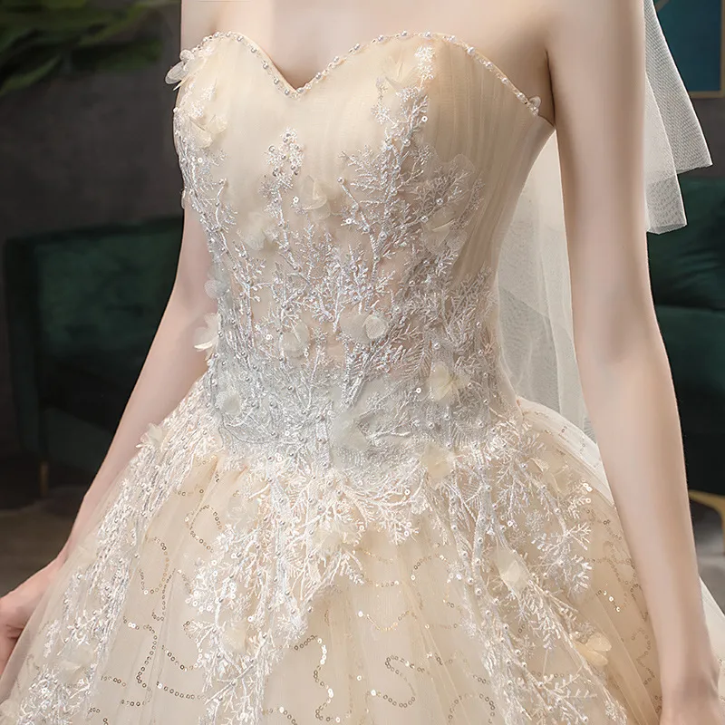 Elegant Strapless Slimming Wedding Dress 2026 Forest Style Bride Gown with Trailing Hem for a Simple and Chic Bridal Look - Image 2