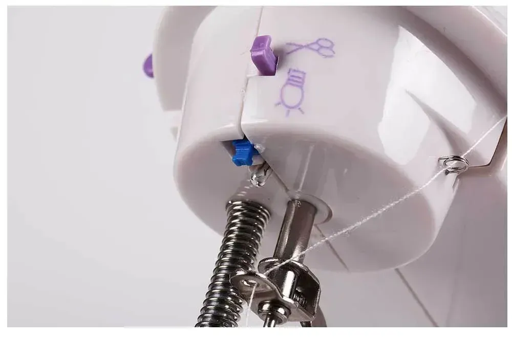 Mini Household Sewing Machine with Light, Foot Pedal & Cutter - Portable 202 Model for Quick Repairs & Crafting showcase 5
