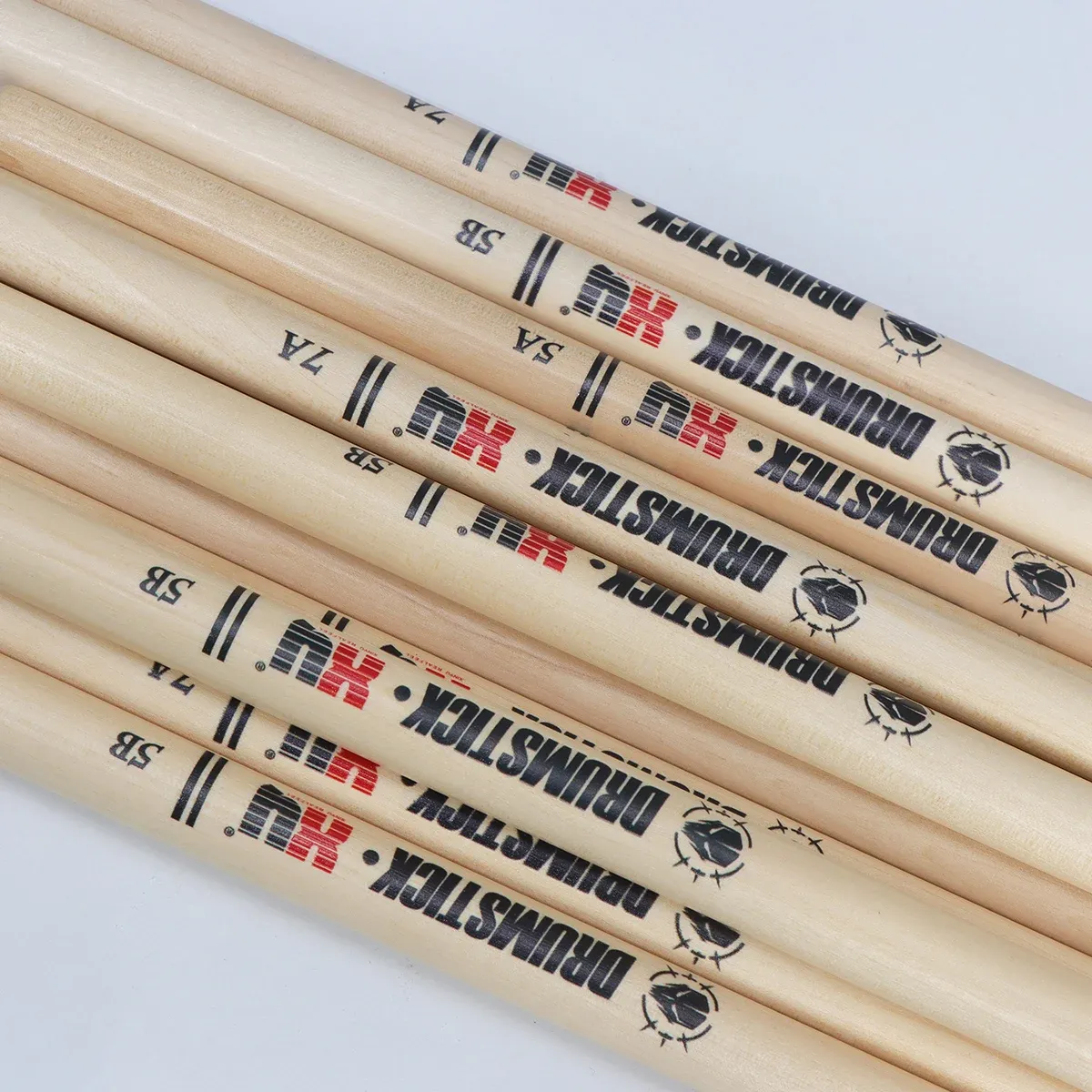 Professional 5A7A5B Maple Wood Drum Sticks with Skull Carving - Durable, Lightweight, and Responsive for Drummers, Live Performances, and Studio Recording