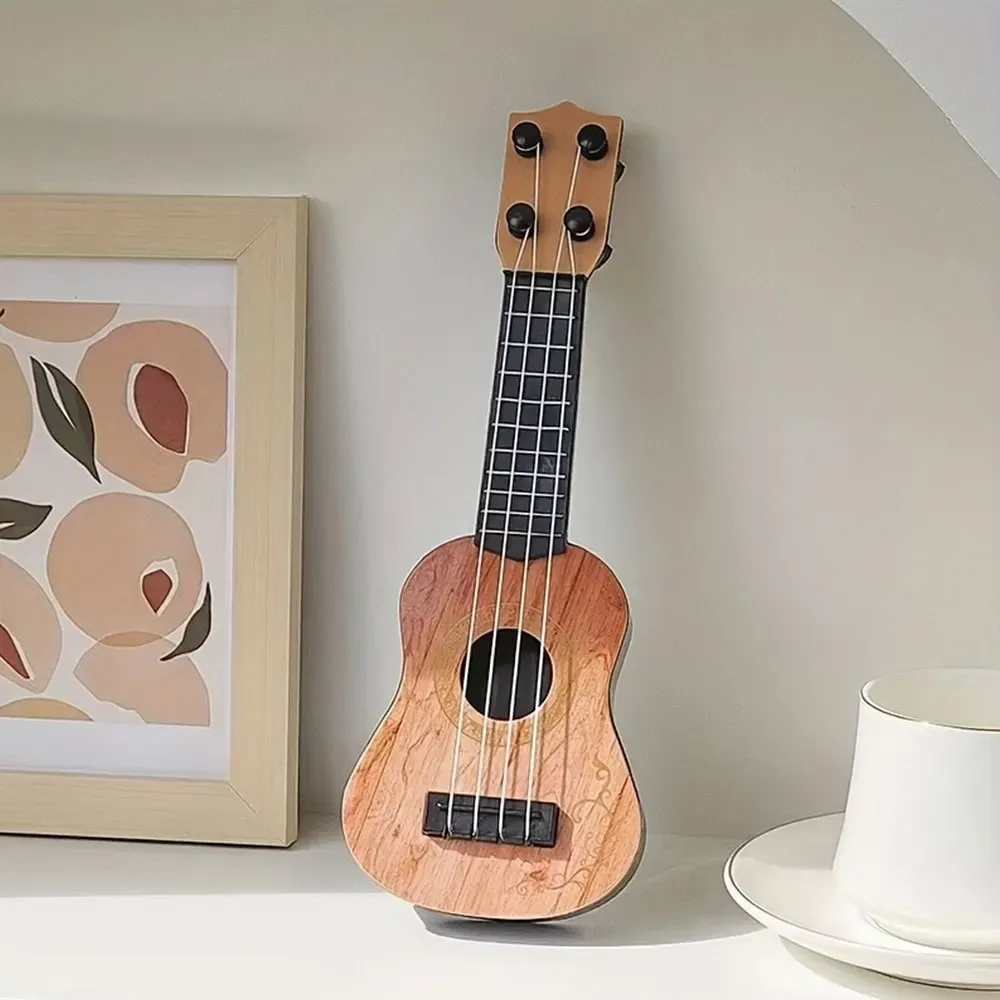 Mini 4-String Classical Ukulele Guitar Toy for Kids Children Beginners - Educational Musical Instrument with Pinus Bungeana Body and ABS Fingerboard showcase 8