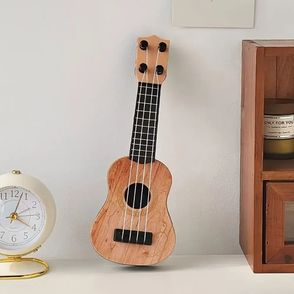 Mini 4-String Classical Ukulele Guitar Toy for Kids Children Beginners - Educational Musical Instrument with Pinus Bungeana Body and ABS Fingerboard showcase 7