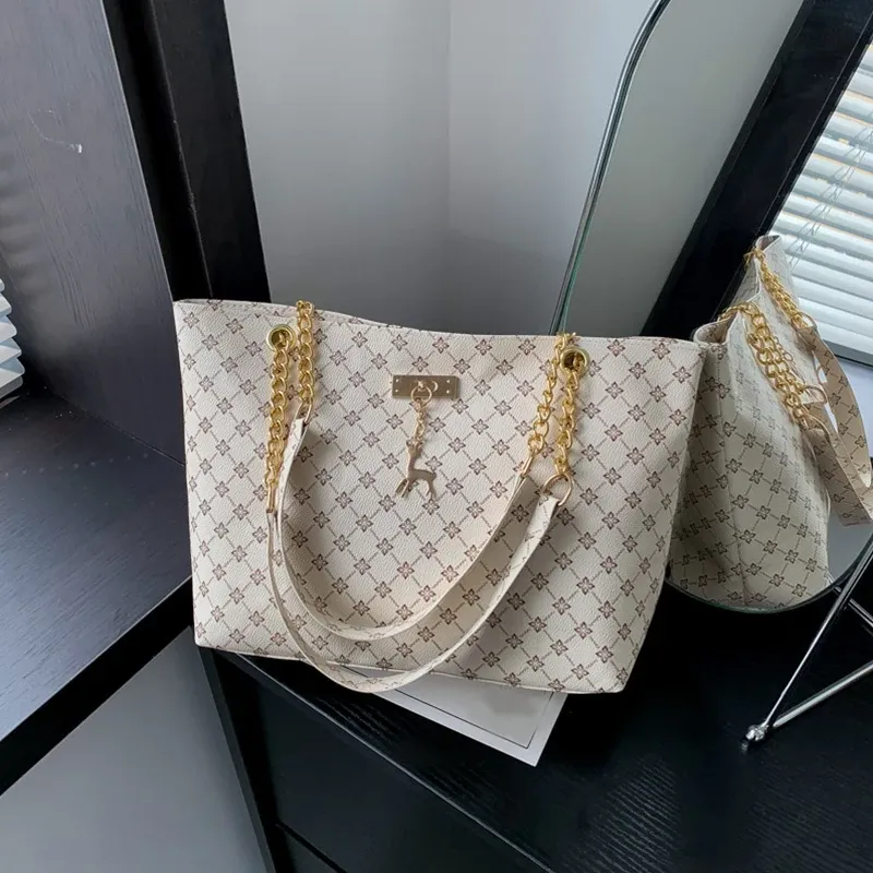 Luxury Handbag Texture Soft Leather Large Capacity Tote Bag for Women, Versatile Shoulder Bag with Hanging Accessories, Stylish Everyday Carryall showcase 23
