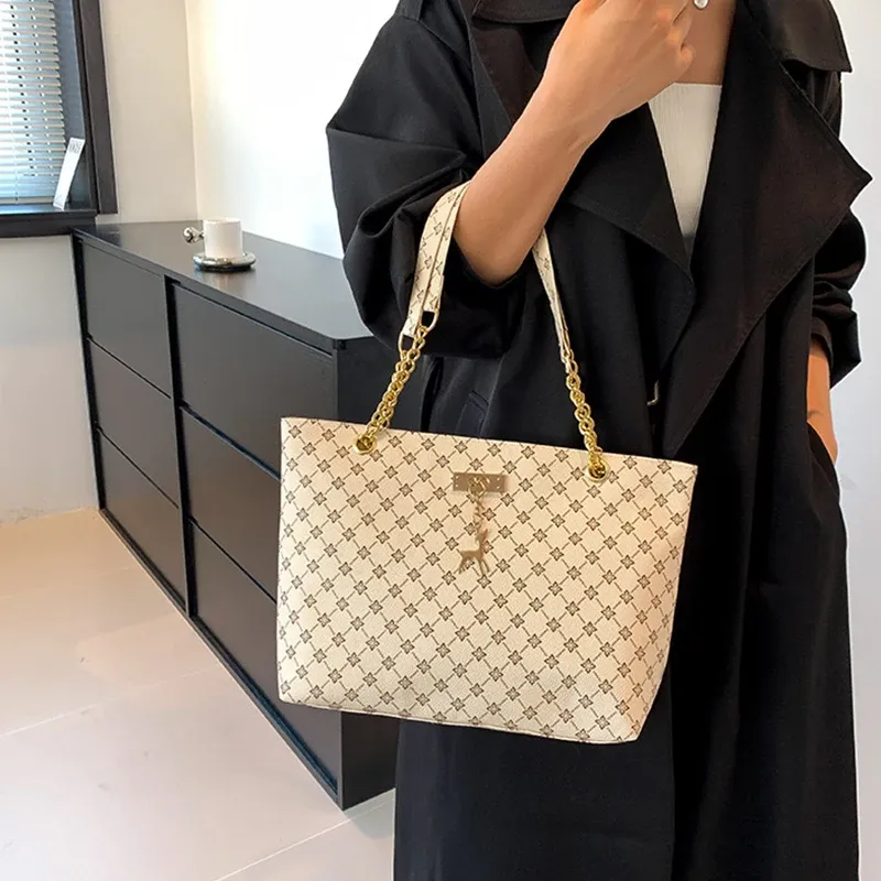 Luxury Handbag Texture Soft Leather Large Capacity Tote Bag for Women, Versatile Shoulder Bag with Hanging Accessories, Stylish Everyday Carryall showcase 5