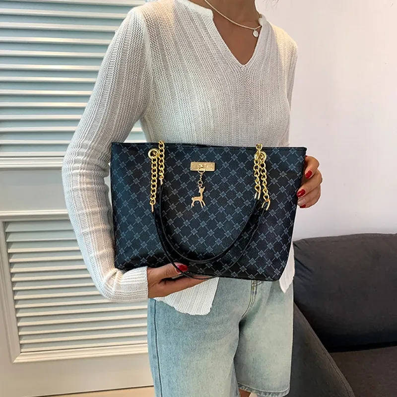 Luxury Handbag Texture Soft Leather Large Capacity Tote Bag for Women, Versatile Shoulder Bag with Hanging Accessories, Stylish Everyday Carryall showcase 9