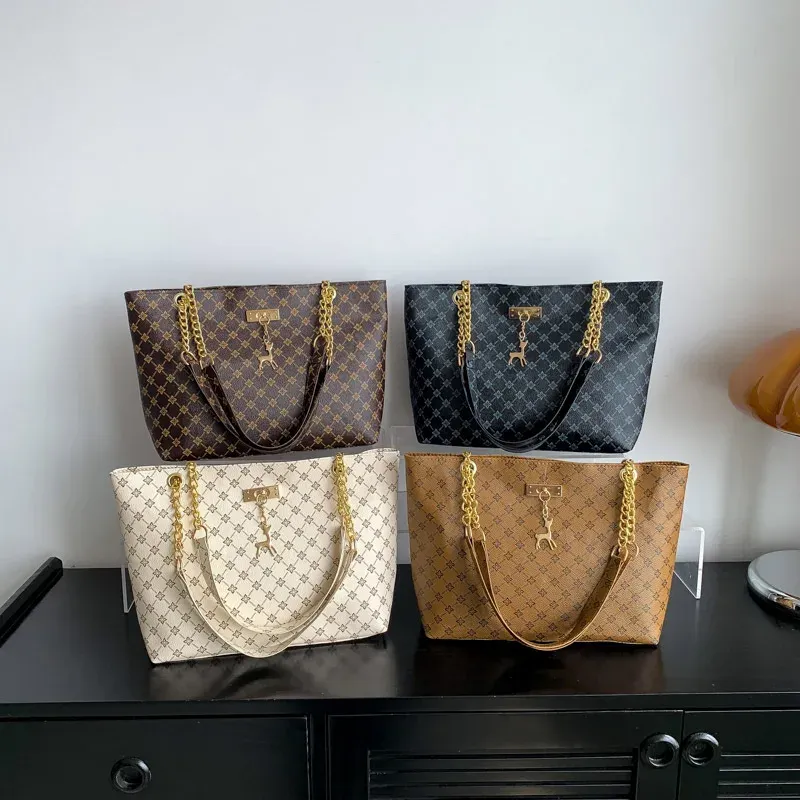 Luxury Handbag Texture Soft Leather Large Capacity Tote Bag for Women, Versatile Shoulder Bag with Hanging Accessories, Stylish Everyday Carryall showcase 19