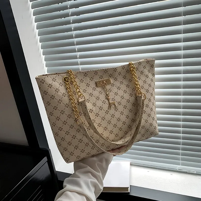 Luxury Handbag Texture Soft Leather Large Capacity Tote Bag for Women, Versatile Shoulder Bag with Hanging Accessories, Stylish Everyday Carryall showcase 24