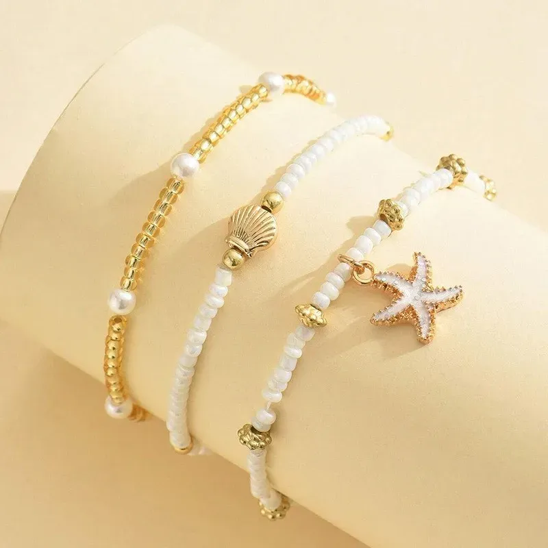 Bohemian Starfish Shell Anklet Set - 3 Layer Millet Bead Ankle Chain, Beachy Elegant Foot Jewelry Accessory for Women - Image 1
