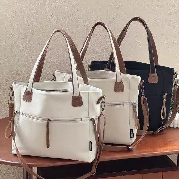 Women's Canvas Tote Bag Large Crossbody Shoulder Handbag with Multiple Zipper Pockets and Brown Straps thumbnail 1