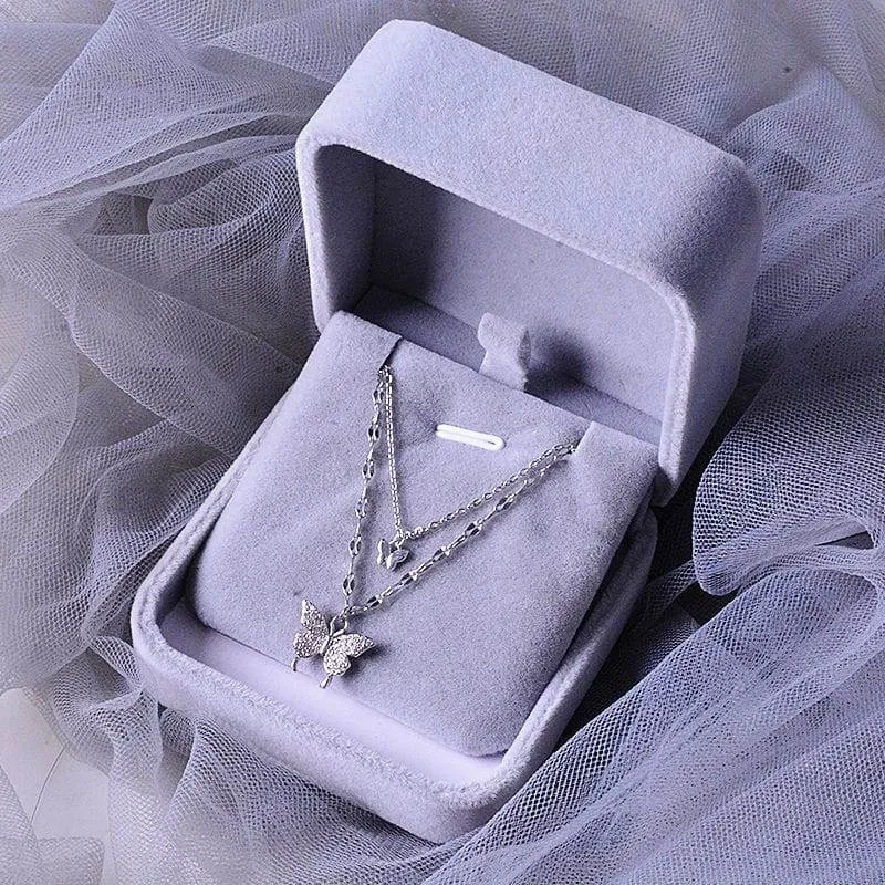 Women's Silver Tone Double Layer Butterfly Pendant Necklace with Sparkling Crystal Accents and Grey Velvet Box thumbnail 5