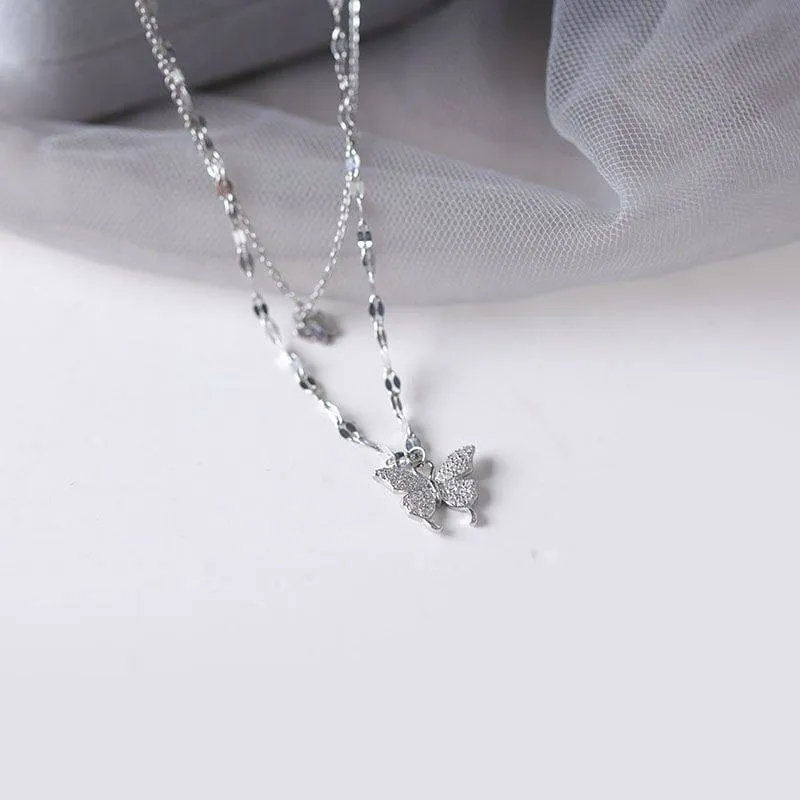 Women's Silver Tone Double Layer Butterfly Pendant Necklace with Sparkling Crystal Accents and Grey Velvet Box thumbnail 1