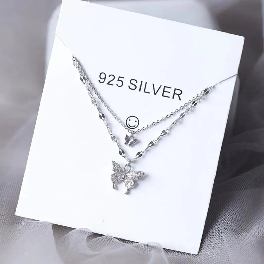 Women's Silver Tone Double Layer Butterfly Pendant Necklace with Sparkling Crystal Accents and Grey Velvet Box showcase 4