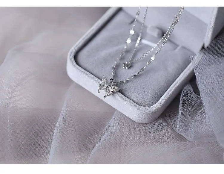 Women's Silver Tone Double Layer Butterfly Pendant Necklace with Sparkling Crystal Accents and Grey Velvet Box showcase 8