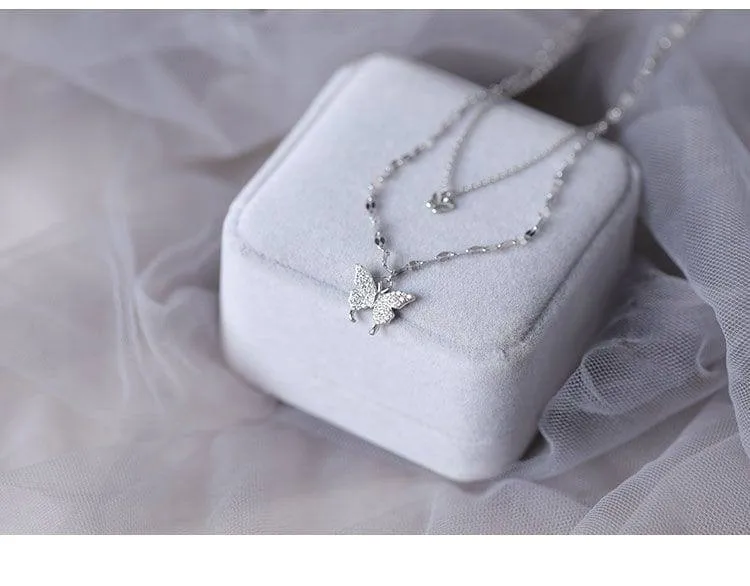 Women's Silver Tone Double Layer Butterfly Pendant Necklace with Sparkling Crystal Accents and Grey Velvet Box showcase 1