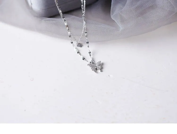 Women's Silver Tone Double Layer Butterfly Pendant Necklace with Sparkling Crystal Accents and Grey Velvet Box showcase 2