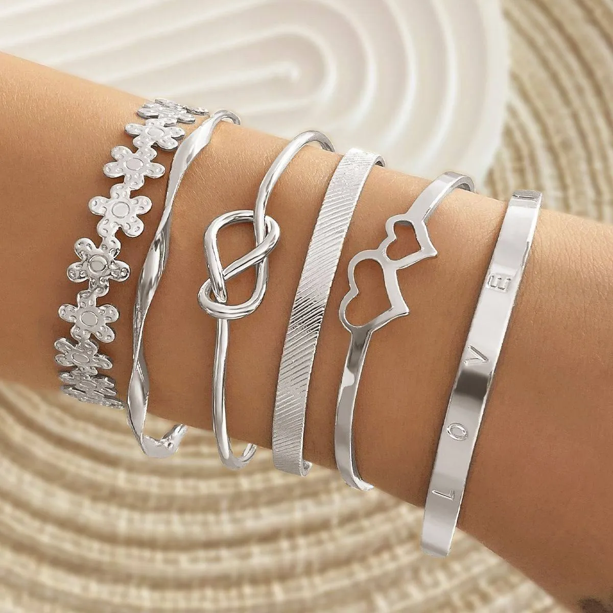 Women's 6-Piece Gold Tone Bangle Bracelet Set Stackable Cuff Set with Knot and Geometric Disc Details showcase 5