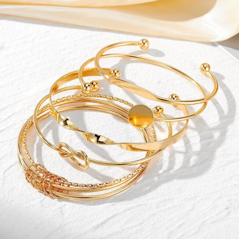 Women's 6-Piece Gold Tone Bangle Bracelet Set Stackable Cuff Set with Knot and Geometric Disc Details showcase 1