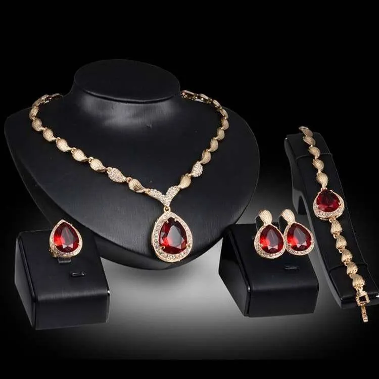 Women's 4-Piece Gold Tone Ruby Red Teardrop Gemstone Jewelry Set Necklace Bracelet Ring and Earrings Formal Evening thumbnail 1