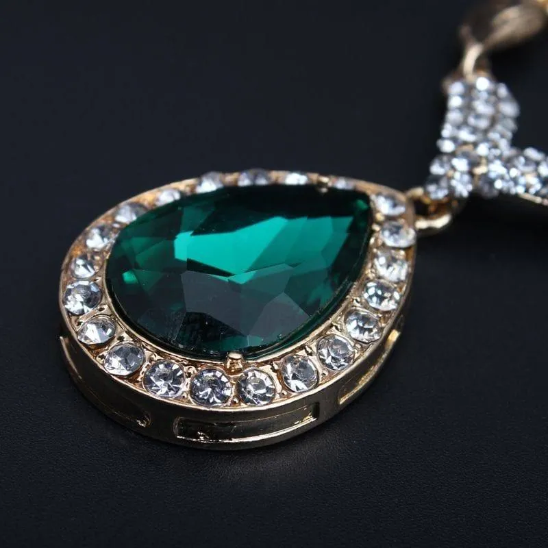 Women's 4-Piece Gold Tone Ruby Red Teardrop Gemstone Jewelry Set Necklace Bracelet Ring and Earrings Formal Evening showcase 5